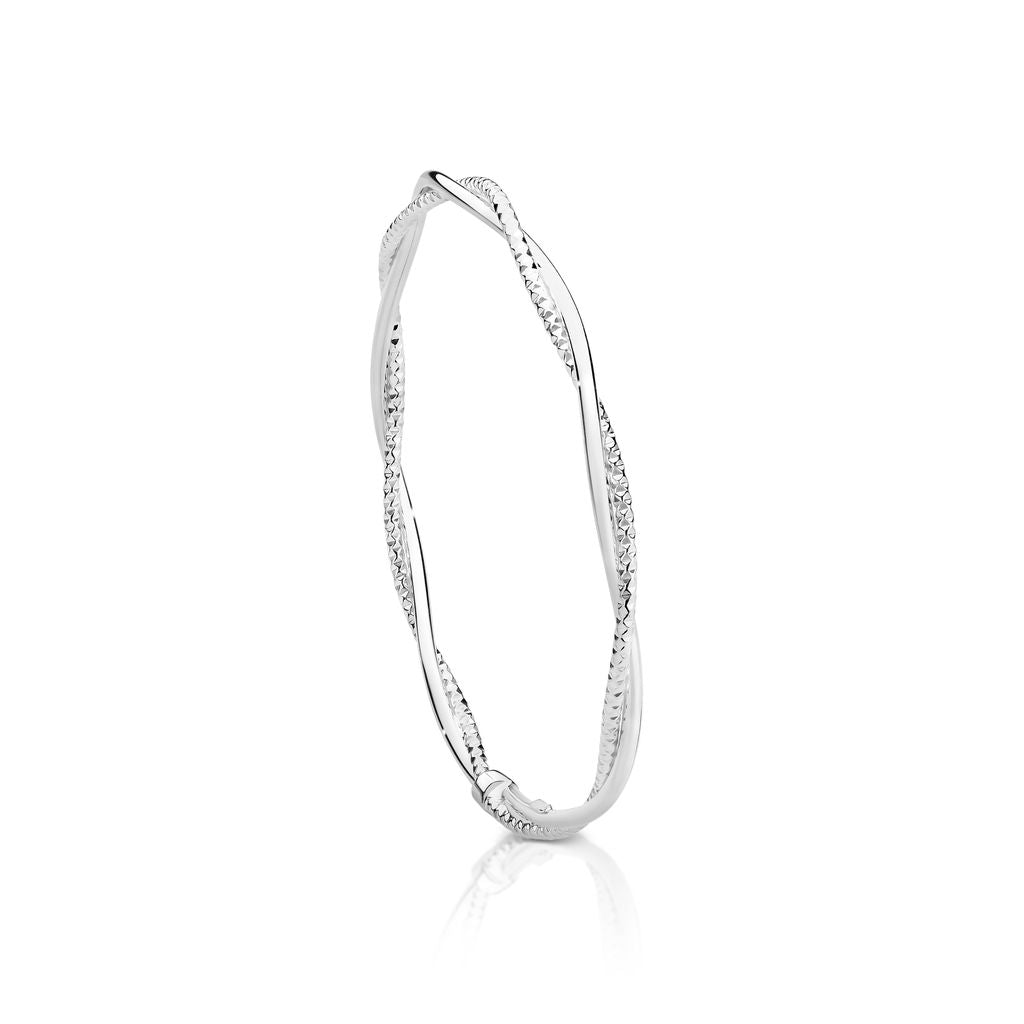 Silver polished and diamond cut twist bangle