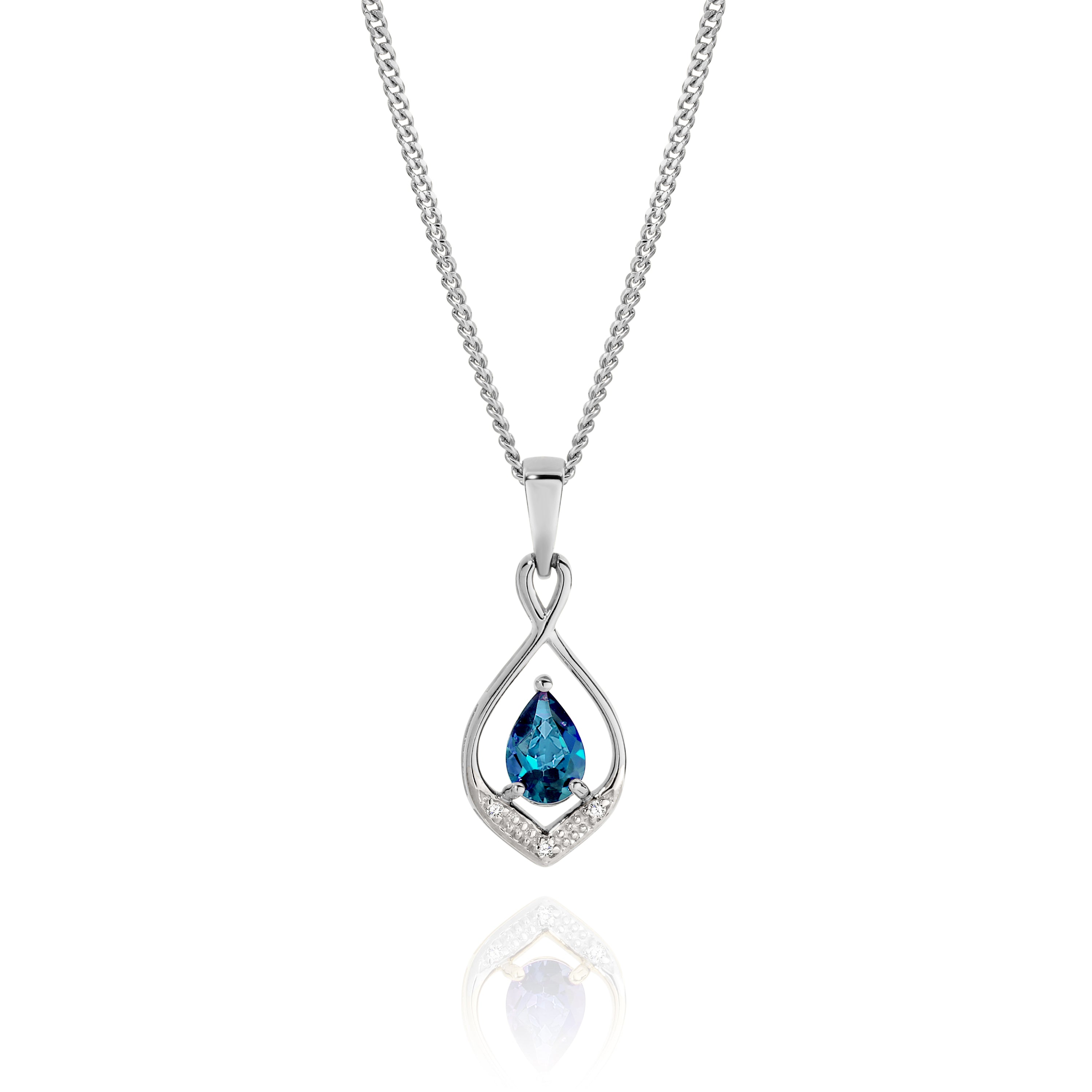 9ct white gold london blue topaz & diamond pendant